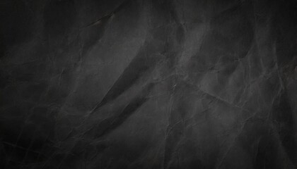 Wall Mural - crumpled black paper texture background