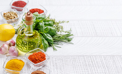 Wall Mural - Various herbs and spices on the table