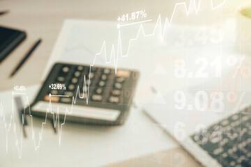 Poster - Abstract virtual financial graph hologram on blurry calculator and computer background, financial and trading concept. Multiexposure
