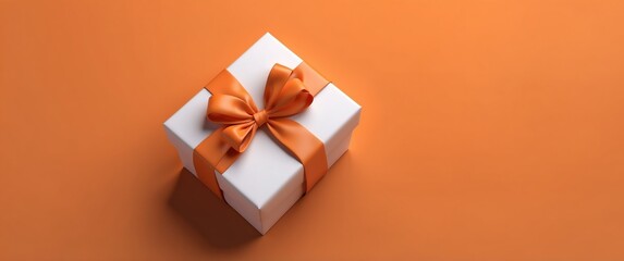Wall Mural - gift box on orange background top view banner with copy space