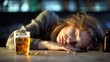 © Pinklife - A woman lays asleep on a wooden table, accompanied by a glass of beer and pills, suggesting a scene of exhaustion or overindulgence in a seemingly distressed setting.