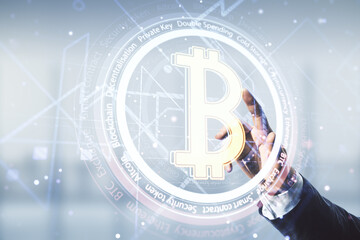Poster - Double exposure of male hand presses on creative Bitcoin symbol hologram on blurred office background. Cryptocurrency concept