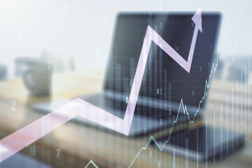 Poster - Double exposure of abstract creative financial chart with upward arrow and modern desktop with laptop on background, research and strategy concept