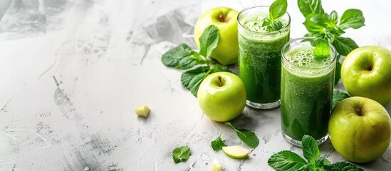 Poster - Fresh green juice and apples with copy space image on a white backdrop