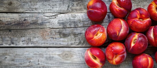 Poster - Nectarines arranged on a wooden surface under natural light, with space for copy images.