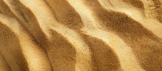Poster - Texture of sand with a copy space image.