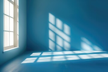 Wall Mural - Blue room with shadows of window frames on the floor.