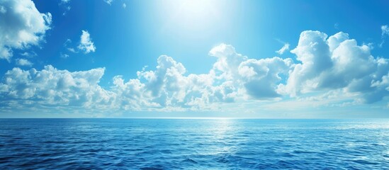Poster - Blue sky and sea water background with an abstract touch, perfect for copy space image.