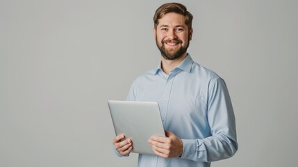 Wall Mural - The smiling man with laptop