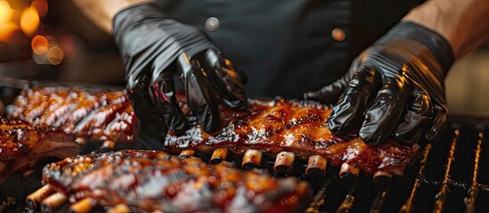 A chef wearing black gloves grills pork ribs in the kitchen, embodying an American fast food theme with a banner, menu, recipe, and ample copy space image.