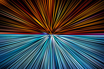 Abstract surface of blur radial zoom in orange, blue, black and white tones . Bright bicolor background with radial, diverging, converging lines. 