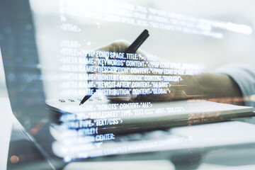 Aufkleber - Double exposure of abstract programming language with hand writing in notebook on background with laptop, research and development concept