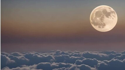 full moon over the clouds