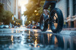 © Karrrtinki - Close-Up of Fat Bike with Rider on Wet City Street During Evening