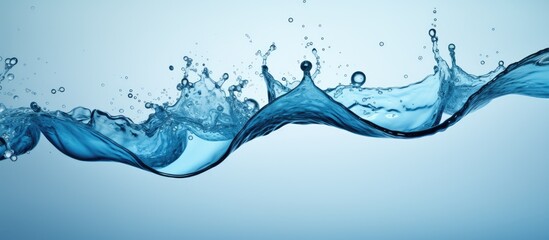 Poster - A water splash in a serene blue hue creates a captivating image with ample copy space.