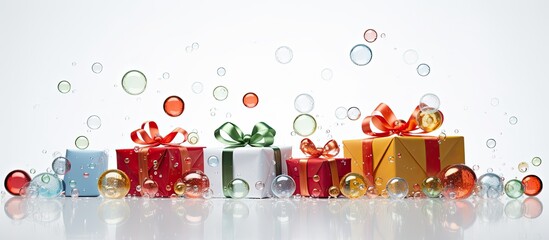 Poster - A festive Christmas gift adorned with holiday-themed bubbles and ribbons set against a white backdrop, perfect for a copy space image.