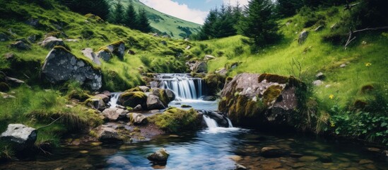 Poster - Mountain scenery with a tranquil small waterfall, providing a serene backdrop for a copy space image.