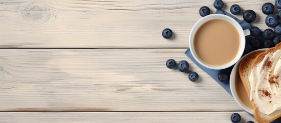 Poster - Tasty toasts with butter, blueberries, and coffee displayed on a gray wooden surface in a flat lay style. Ideal for adding any text in the image. with copy space image
