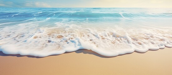 Poster - Sandy beach in summer with foamy waves, ideal for text in a copy space image.