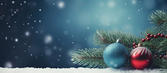 Poster - Spruce branch adorned with Christmas toy, beads, and snow with copy space image.