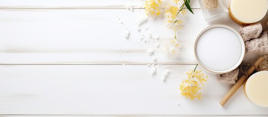 Poster - Flat lay composition of natural body care or bath products on a white wooden background with room for text. Top view copy space image.
