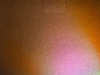 Wall Mural - pink light reflections on a plastic sheet in the dark for an abstract background.