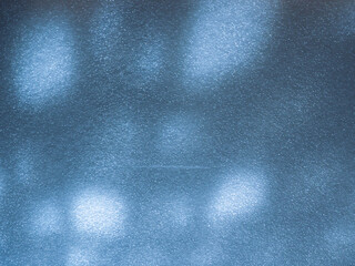 Wall Mural - light reflections on a plastic sheet in the dark for an abstract background.