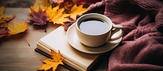 Aufkleber - A cozy autumn home setting with yellow and burgundy blankets, a cup of coffee, colorful leaves, and a notebook featuring copy space image, ideal for a feminine blog or social media post.
