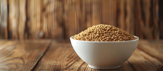 Poster - White bowl containing fenugreek placed on a brown wood backdrop, ideal for health-related content like healthy eating, ayurveda, and naturopathy, with space for additional images.