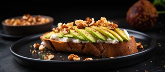 Aufkleber - French loaf slices topped with avocado, poached egg, and walnuts on a black lava plate on a wooden table with a warm tone background enhancing the copy space image.