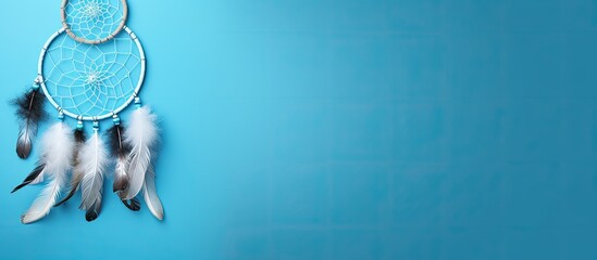 Poster - Top view of a dream catcher feature Asian attributes on a blue background with copy space image available.