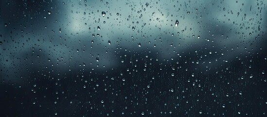 Aufkleber - Raindrops on glass against a dark backdrop with copy space image.