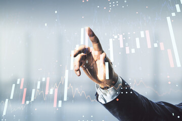 Poster - Double exposure of man hand clicks on abstract creative financial chart hologram on blurred office background, research and strategy concept