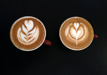 Two fresh cups of cappuccino