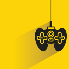 Wall Mural - game controller and joystick icon on yellow background