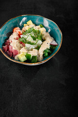 Sticker - Tuna Poke Bowl with Fresh Vegetables on Dark Background