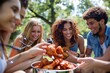 © kittipoj - Happy Friends Enjoying Delicious Fried Chicken Picnic in the Park