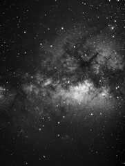 Wall Mural - a black and white photo of a starry sky. the stars are scattered throughout the image, creating a se