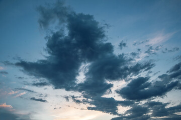 Wall Mural - Sunset in with dramatic storm clouds.