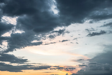 Wall Mural - Sunset in with dramatic storm clouds.