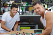 © auremar - two man playing foosball table game