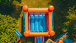 © Галя Дорожинська - Aerial view of inflatable bounce house. Generative by AI