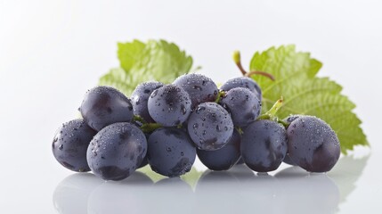 Wall Mural - Fresh black grapes with water droplets on white background, macro shot. Healthy eating and fruit concept