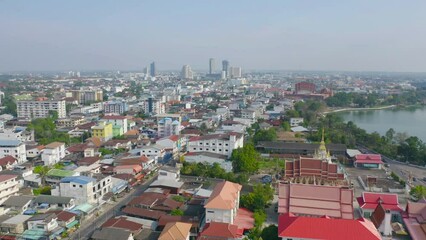 Poster - Aerial view of local residential neighborhood roofs. Urban housing development from above. Top view. Real estate in Isan urban city town, Thailand. Property real estate.