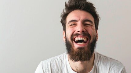 Man with beard and white tshirt making funny face in travelthemed comedy portrait photo