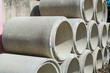 © yotrakbutda - Asbestos cement pipes stacked on a construction site