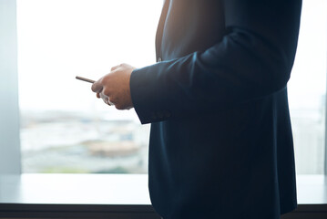 Aufkleber - Business office, window and hands of man with phone for social media, technology or client feedback and communication. Smartphone, app and male broker online for advice, consulting or b2b networking