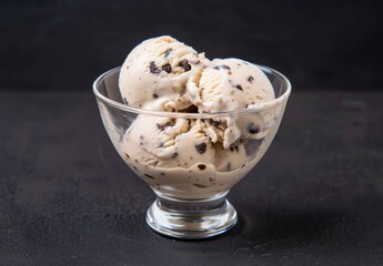 Wall Mural - Delicious scoops of chocolate chip ice cream in a glass bowl