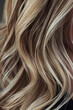 © BetterPhoto - Closeup of blonde wavy hair showcasing texture and highlights