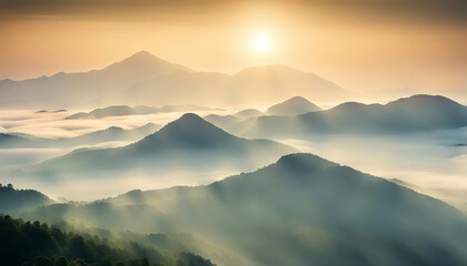 Wall Mural - Beautiful sunrise over misty mountain range in the morning